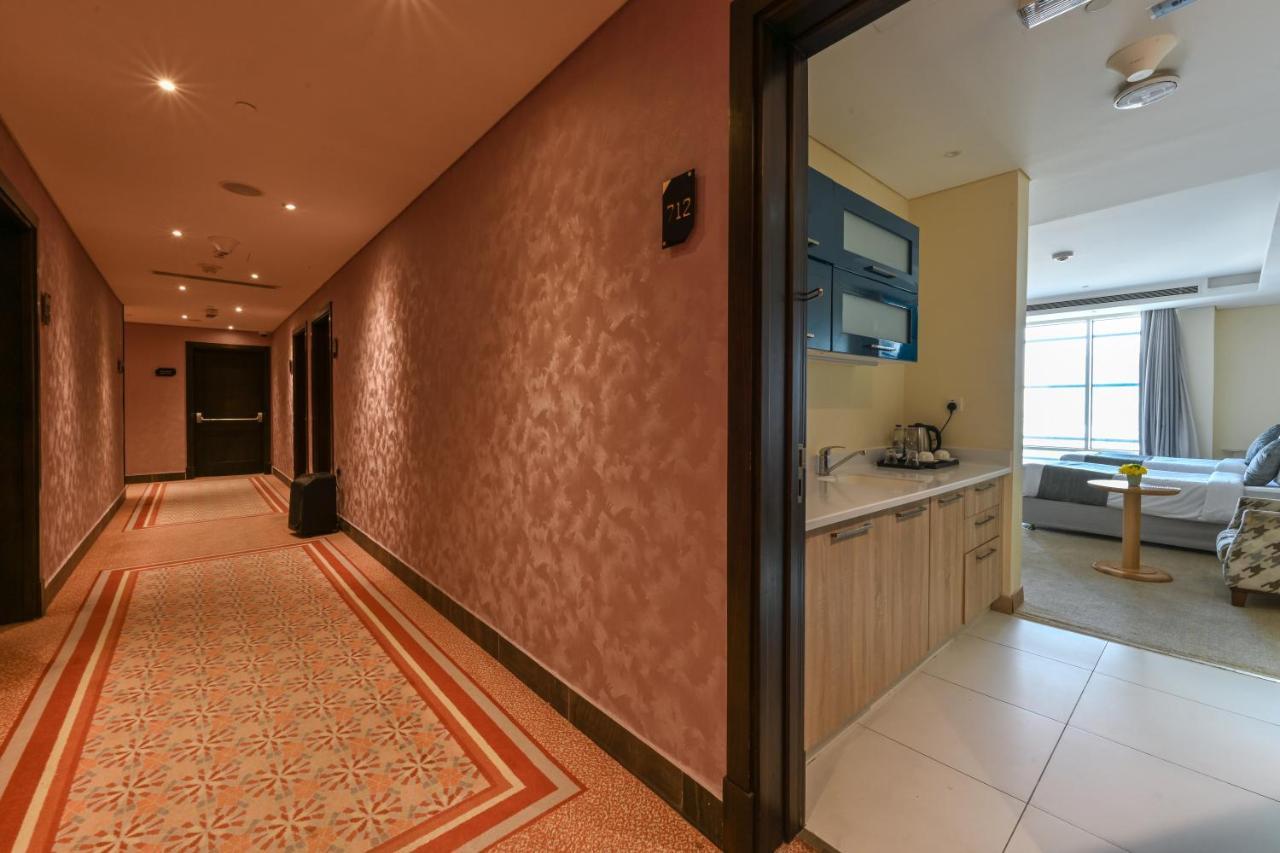 Al Mansour Suites Hotel Doha Exteriör bild
