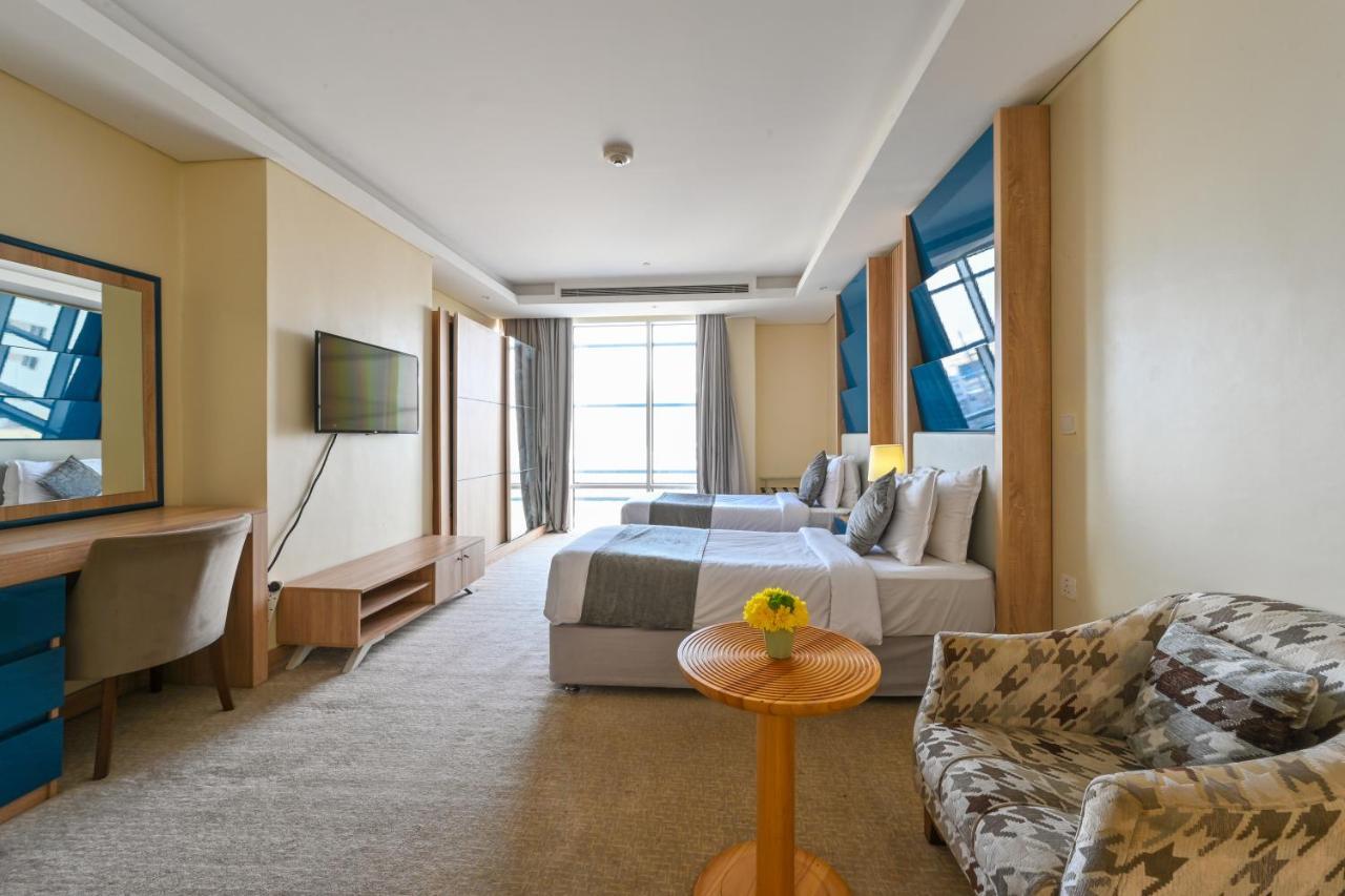 Al Mansour Suites Hotel Doha Exteriör bild