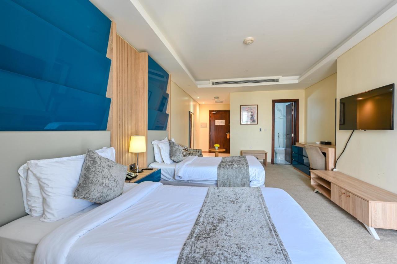 Al Mansour Suites Hotel Doha Exteriör bild