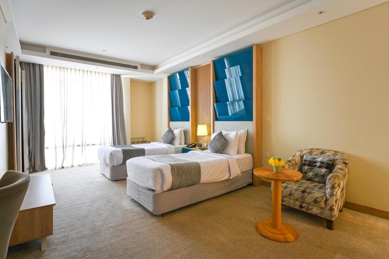 Al Mansour Suites Hotel Doha Exteriör bild