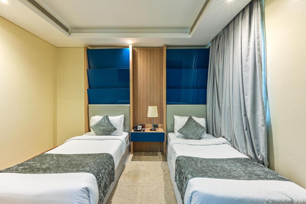 Al Mansour Suites Hotel Doha Exteriör bild